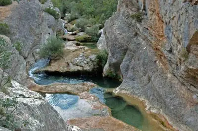 a river in the middle of a rocky canyon at Soleil Sucré T2 Centre historique de Narbonne in Narbonne