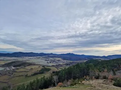 a view of a valley from a hill with mountains at Gîte l'Enclos Ô rendez-vous Roquefeuil-Pays de sault- avec jardin in Roquefeuil