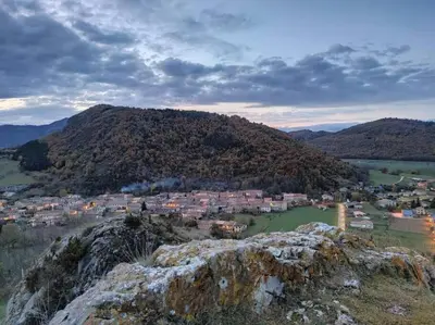 a view of a town on top of a mountain at Gîte l'Enclos Ô rendez-vous Roquefeuil-Pays de sault- avec jardin in Roquefeuil