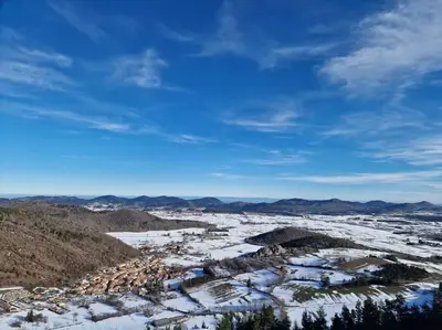 an aerial view of a town in the snow at Gîte l'Enclos Ô rendez-vous Roquefeuil-Pays de sault- avec jardin in Roquefeuil