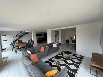 a living room with a couch and a table at La Villa Nina in Mirepeisset