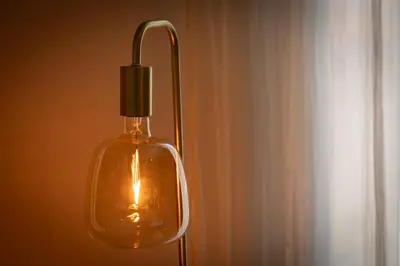 a glass bottle hanging from a light pole at Maison de Vacances 8 à 15 pers à proximité du Canal du Midi in Sallèles-dʼAude