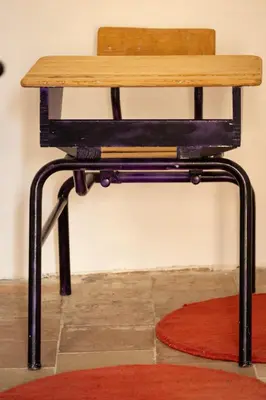 a wooden table on a stool with a bench at Maison de Vacances 8 à 15 pers à proximité du Canal du Midi in Sallèles-dʼAude