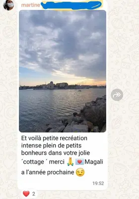 a screenshot of a cell phone with a picture of the water at Appartement RDC vue mer - GRUISSAN in Gruissan