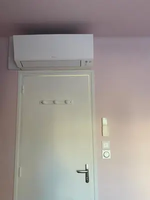 a white door with a stove above it at Maison face à la cité in Carcassonne