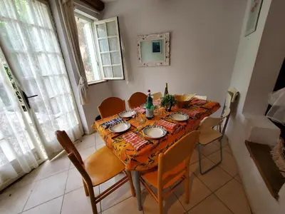 a table with two bottles of wine and glasses on it at OCC34 - Capestang - Vigneron in Capestang