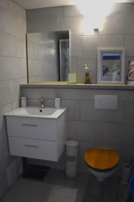 a bathroom with a sink and a toilet at L'Occitania Chambre d'hotes in Puivert