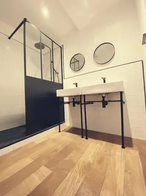 a bathroom with a sink and a shower at Maison de campagne dans un domaine viticole in Tautavel
