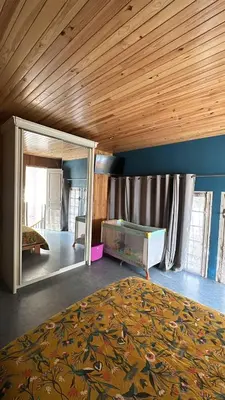 a bedroom with a bed and a wooden ceiling at Chez BEN avec tout le confort clim wifi Netflix gratuit in Castres