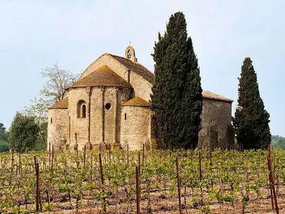 an old church in a field of vines at Apartment in Azille near Lac de Jouarres in Azille