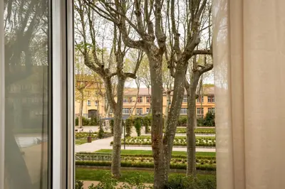 a view of a building from a window at L'art de Gambetta ConciergerieDameCarcas in Carcassonne
