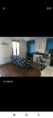 a picture of a living room with a couch at Charmant T2 refait à neuf, au cœur de Puylaurens in Puylaurens