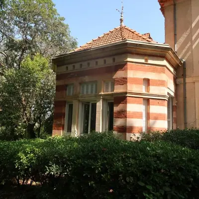a building with a tower on top of it at Gîte du parc à Langel in Armissan