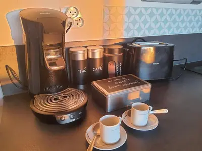 a counter with two cups of coffee and a blender at Au bord de l'eau, Profitez d'un moment de calme ! in Gruissan